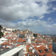Lisbon’s rooftops, and sun-worshippers, on the roof of the Memmo Alfama.